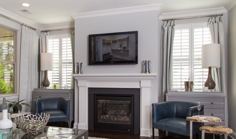 Sacramento fireplace with white shutters.